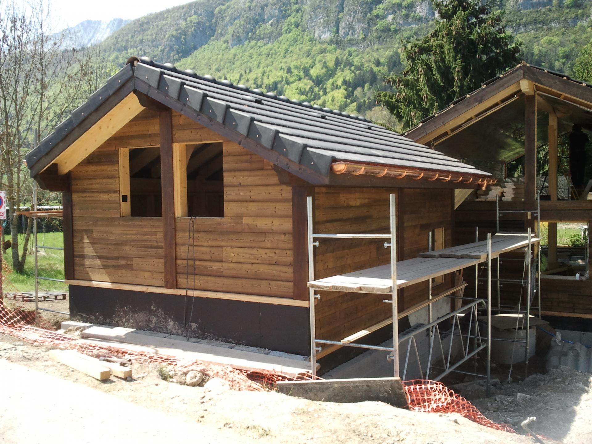 RÉALISATION D'UNE MAISON POTEAUX POUTRES